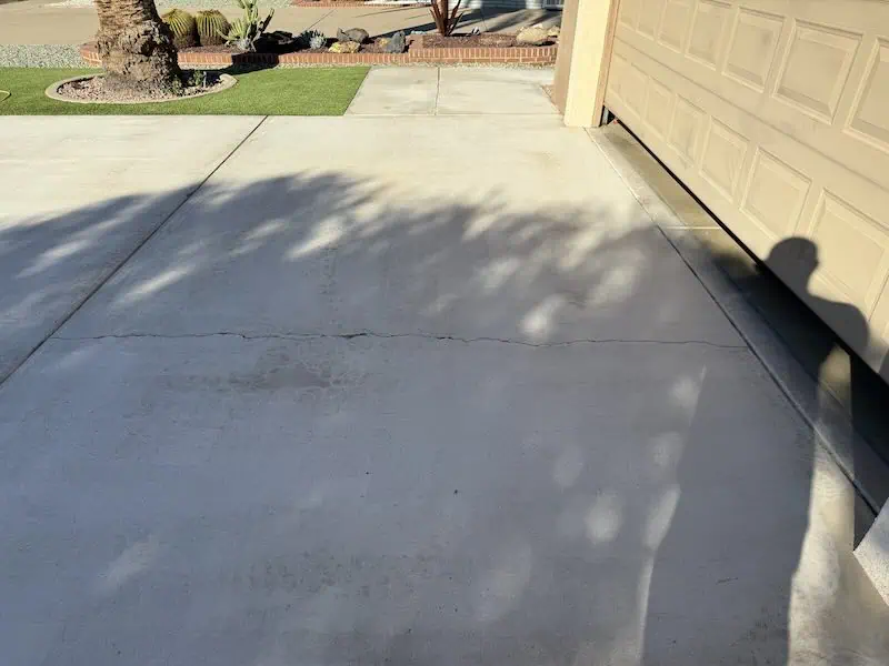 Cracked Concrete Sidewalk Prior to Restoration