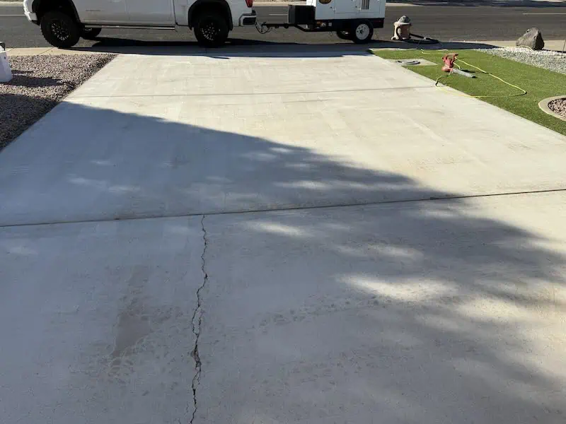 Badly Water Stained Driveway Before Resurfacing