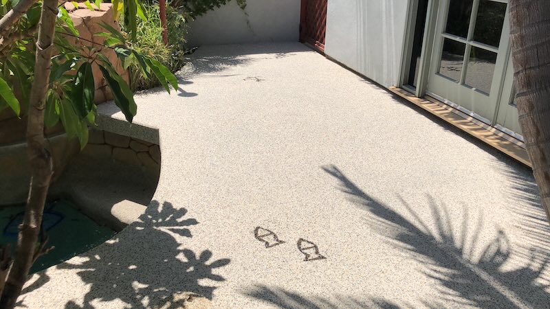 Drained Pebble Walkways Avoiding Pool Splashes
