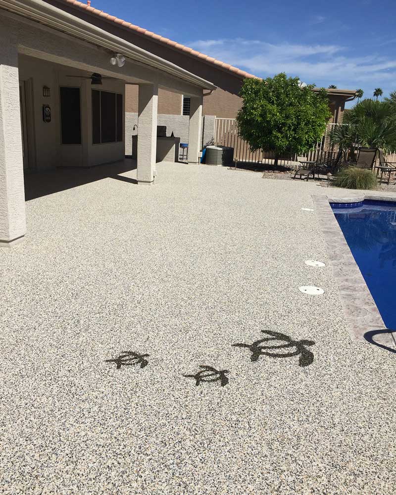 Finished High-Density Pebble Deck Swimming Pool Border