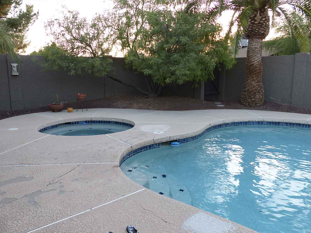 Before: Cracked Spa and Pool Deck Surface