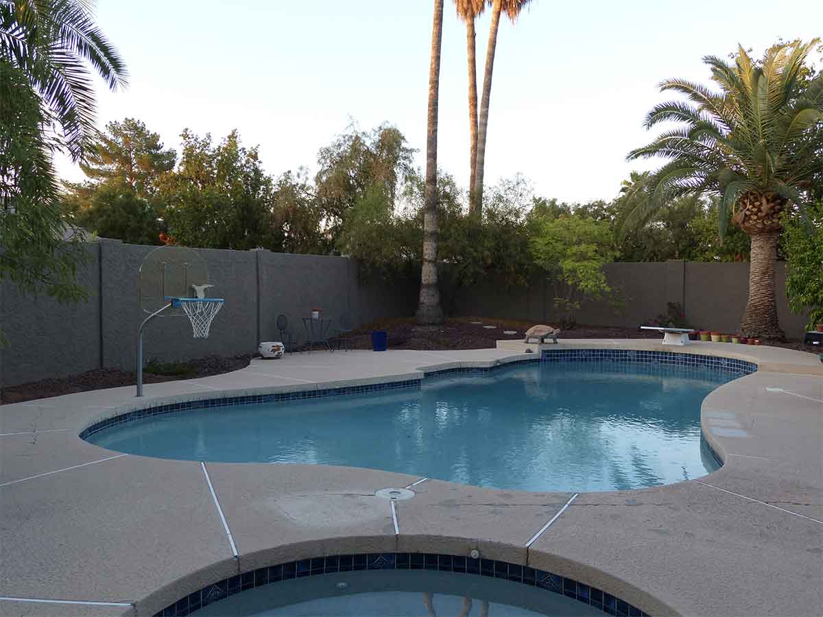 Before: Faded and Cracked Pool Deck Surface